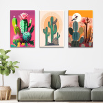 Tableau Mexique cactus pop art accroché dans un salon au-dessus d'un canapé bas dans les tons gris avec coussins blancs et plante verte à côté